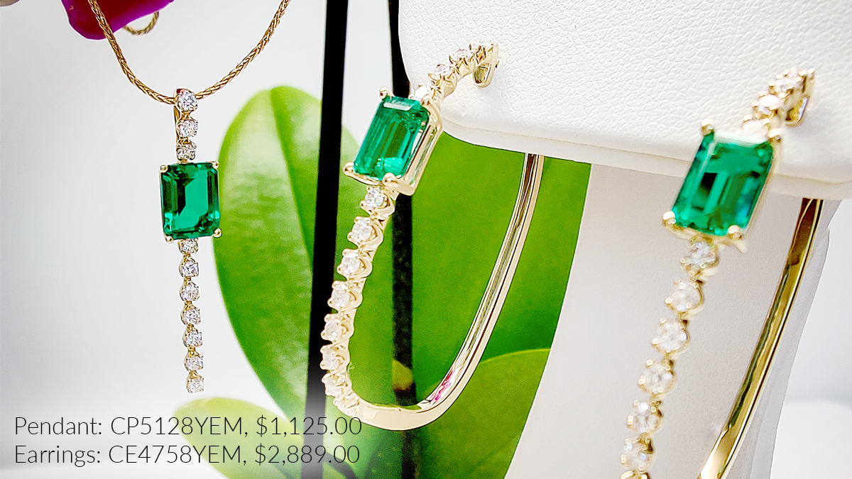 A 14K yellow gold lab-grown emerald pendant with lab-grown diamonds: CP5128YEM costs $1,125.00. The matching hoop earrings are CE4758YEM and cost $2,889.00.