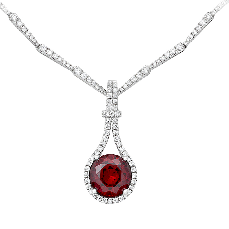 14K white gold necklace featuring a 5.25cts round Chatham lab grown ruby and 1.53cts of lab grown diamond accents.