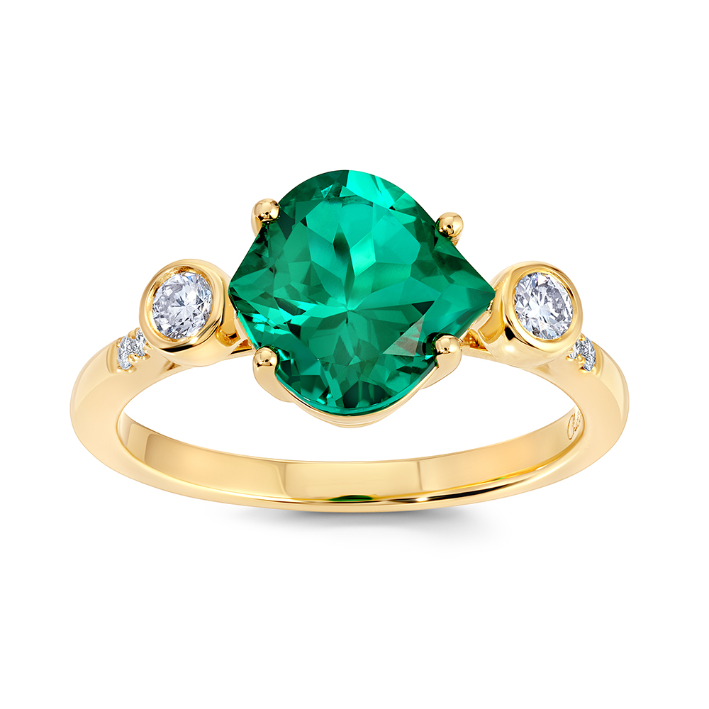 Onion cut Chatham lab grown emerald ring with lab grown diamond accents set in 14K yellow gold