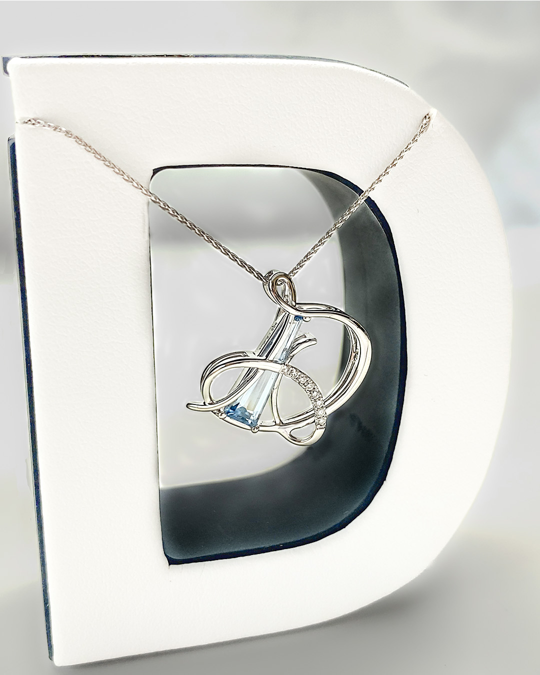 Sterling silver initial letter "D" pendant with Chatham lab grown aqua blue spinel tapered baguette